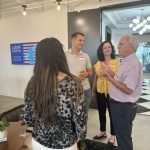 i4Series attendees are networking after a panel discussion about business resiliency featuring Go Fig AI co-founder Nathan Freystraetter.