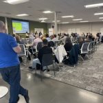 Pictures of entrepreneurs listening to panelists at the Founders Forum
